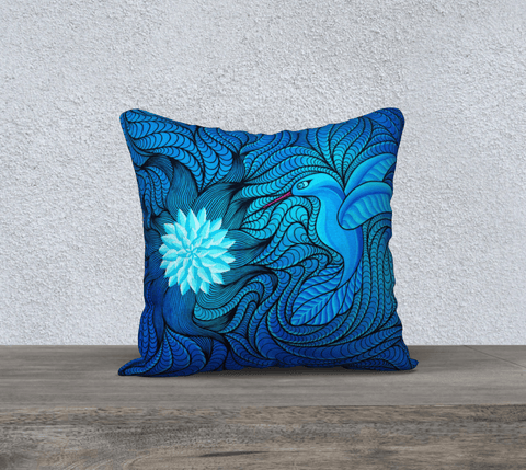 Square pillow, blue, printed with image of a bird in flight and a flower.