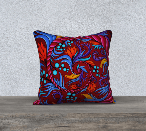 Square art-printed pillow, multicolor spiral design with flowers and birds on dark red background.