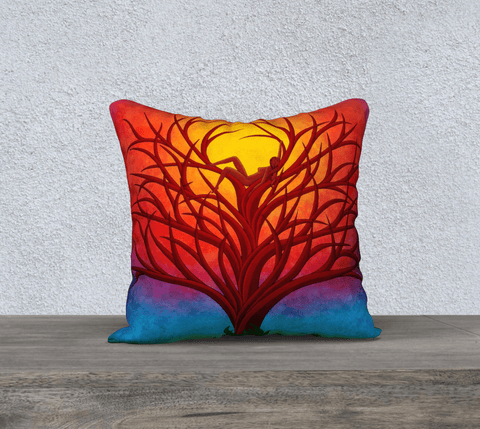 Rainbow colored square pillow with image of a woman sitting in a tree
