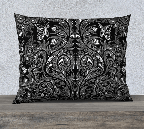 Rectangular black and white art-printed pillow.